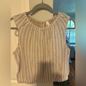 Beautiful sleeveless top with bubble hem